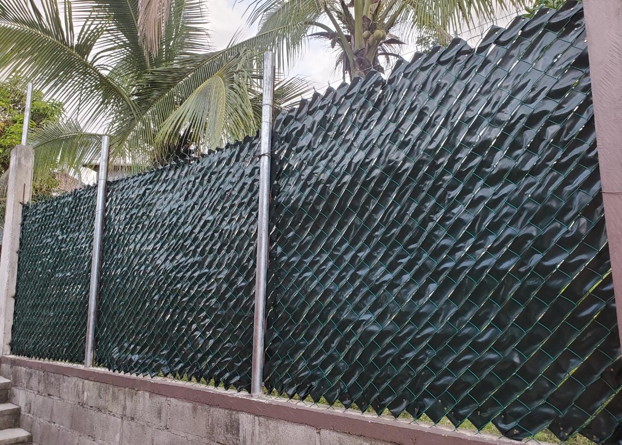 Example of privacy tape on a customer's fence.